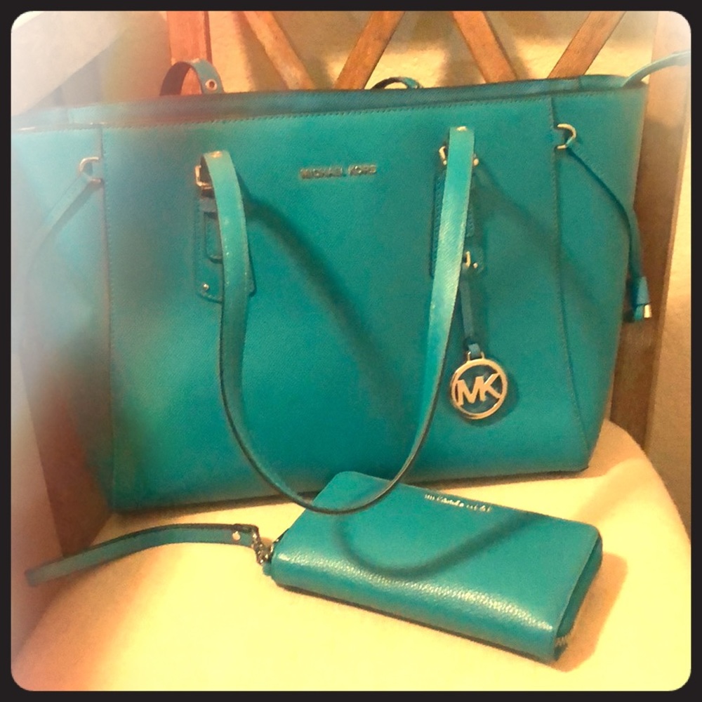 Teal michael kors purse and wallet